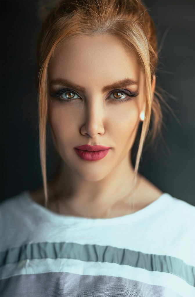 A picture of a woman looking into the camera